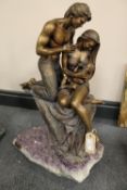 An Ebano Vidal bronze and rock crystal sculpture - A young couple with child, width 43 cm. CONDITION