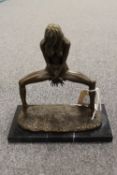 A bronze study depicting a Lady on her tip toes on black marble plinth, height 23 cm.  CONDITION