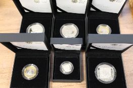 A Royal Mint five pound silver proof coin 2008, together with five other silver proof coins, all