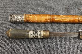 A late nineteenth century sword stick, with horn grip, together with a smaller stick mounted in