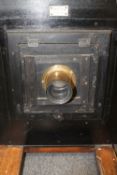 A nineteenth century Penrose & Co. mahogany photographic enlarger,with ratchet mechanism, Ross