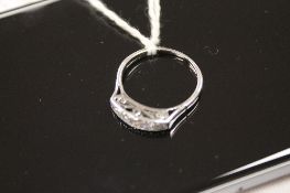 An Art Deco 14ct white gold five stone diamond ring. CONDITION REPORT: Good condition.