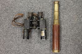 An early twentieth century brass and leather sleeved field telescope, together with  a pair of