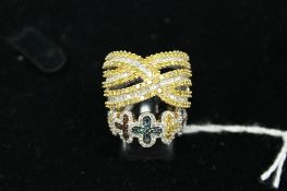 Two Lady's rings set with coloured diamonds. (2) CONDITION REPORT: Good condition. 9.4g gross.