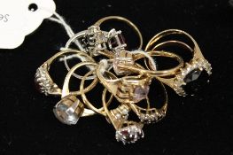 A collection of eleven gold and yellow metal dress rings. (11) CONDITION REPORT: Good condition to