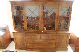 A nineteenth century mahogany breakfront bookcase, width 232cm.