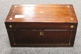 A Victorian rosewood tea caddy, inlaid with mother of pearl, width 27 cm. CONDITION REPORT: Mostly