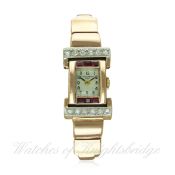A FINE & RARE LADIES 18K SOLID PINK GOLD DIAMOND & RUBY SET PATEK PHILIPPE BRACELET WATCH CIRCA