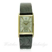 A GENTLEMAN'S 18K SOLID GOLD JAEGER LECOULTRE RECTANGULAR WRIST WATCH CIRCA 1940s D: Two tone silver