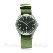 A GENTLEMAN'S STAINLESS STEEL BRITISH MILITARY SMITHS WRIST WATCH CIRCA 1960s
D: Black dial with