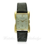 A GENTLEMAN'S 18K SOLID GOLD IWC RECTANGULAR WRIST WATCH CIRCA 1950
D: Silver dial with gilt pyramid