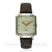 A RARE GENTLEMAN'S STAINLESS STEEL IWC WRIST WATCH CIRCA 1950 D: Silver dial with gilt hour markers,