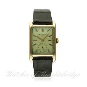 A RARE GENTLEMAN'S 18K SOLID ROSE GOLD PATEK PHILIPPE RECTANGULAR WRIST WATCH DATED 1950, REF.