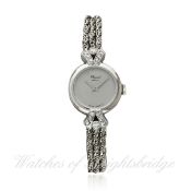 A LADIES 18K SOLID WHITE GOLD & DIAMOND CHOPARD BRACELET WATCH CIRCA 1980s, REF. 841 D: Silver
