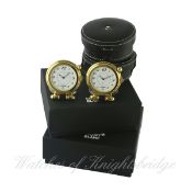 TWO GILT METAL MONTBLANC MEISTERSTUCK TRAVEL ALARM CLOCKS CIRCA 2012, REF.29313 IN UNUSED