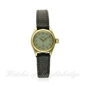 A LADIES 18K SOLID GOLD ROLEX OYSTER WRIST WATCH CIRCA 1950s, REF. 6525
D: Silver dial with gilt 