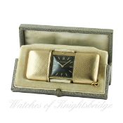 A RARE 9CT SOLID GOLD MOVADO EMERTO CHRONOMETER TRAVEL WATCH CIRCA 1930s IN ORIGINAL FITTED BOX
D: