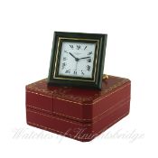 A CARTIER PARIS DESK ALARM CLOCK DATED 1980, REF.7503 WITH ORIGINAL BOX & PAPERS
D: White dial