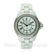 A LADIES MID SIZE WHITE CERAMIC & DIAMOND CHANEL J12 BRACELET WATCH DATED 2007, WITH BOX & PAPERS
D: