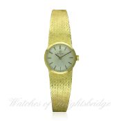 A LADIES 18K SOLID GOLD OMEGA BRACELET WATCH CIRCA 1969, REF. B28321
D: Silver dial with black &