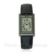 A MID SIZE STAINLESS STEEL CARTIER TANK BASCULANTE WRIST WATCH CIRCA 2002, REF. 2405 WITH CARTIER