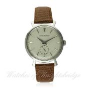 A GENTLEMAN'S STAINLESS STEEL JAEGER LECOULTRE WRIST WATCH CIRCA 1950s
D: Silver dial with silver 
