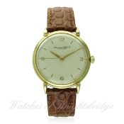 A GENTLEMAN'S 18K SOLID GOLD IWC WRIST WATCH CIRCA 1950s D: Silver dial with gilt Arabic