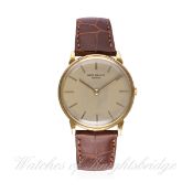 A GENTLEMAN'S 18K SOLID GOLD PATEK PHILIPPE CALATRAVA WRIST WATCH CIRCA 1960s, REF. 2573-1 WITH