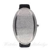 A LARGE STAINLESS STEEL DIAMOND SET WRIST WATCH BY MARCO MAVILLE 