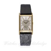 A GENTLEMAN'S 18K SOLID GOLD JAEGER LECOULTRE RECTANGULAR WRIST WATCH CIRCA 1940s D: Two tone silver