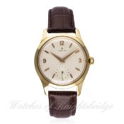 A RARE GENTLEMAN'S 18K SOLID GOLD ZENITH STÖTSÄKRAD WRIST WATCH CIRCA 1960 D: Silver dial with