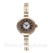 A LADIES 9CT SOLID GOLD ROLEX HALF HUNTER BRACELET WATCH CIRCA 1920s D: White enamel dial. M: 15