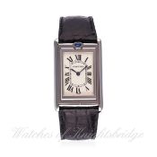 A GENTLEMAN'S STAINLESS STEEL CARTIER TANK BASCULANTE 