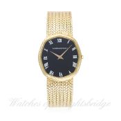 A GENTLEMAN'S 18K SOLID GOLD AUDEMARS PIGUET BRACELET WATCH CIRCA 1970s 
D: Black dial with white