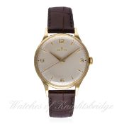 A GENTLEMAN'S 18K SOLID GOLD ZENITH WRIST WATCH CIRCA 1950s D: Silver dial with gilt 