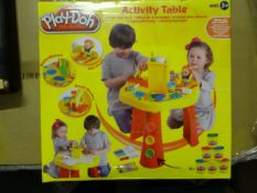 1 x Play-Doh Large Activity Table. Includes: Play-Doh, Hair Studio, Dough machine, Waffle machine