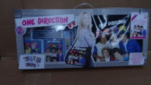 12 x One Direction (1D) large tour case gift set. Each set includes: 1 x A6 Spiral notebook, 15cm