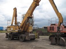 Liebherr 932 Rehandler on Wheels 1998 Good condition, high cab, solid wheels, long reach