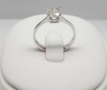 14ct White Gold Diamond Solitaire Ring, claw set with a brilliant round cut diamond 1.20ct