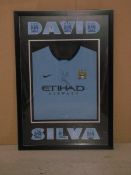26 ½ x 38 ½ M/C City’s David Silva signed shirt