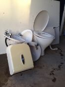 3 sinks, 1 toilet and 1 paper towel dispenser