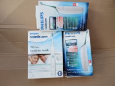 3 x Phillips Sonicare Electric toothbrushes. Includes 2 x Phillips Sonicare AirFloss and 1 x