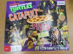 3 x Nikelodeon Teenage ninja turtles Catapult pizza game. Includes 4 pizza catapults. Box damaged