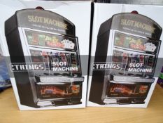 3 x :Things Slot Machines. Can be used as a money box. High quality. Boxed damaged stock. High