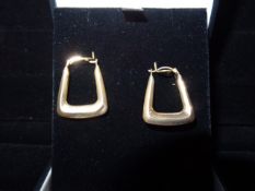 1 x Pair of 9 Carat Yellow Gold 'Handbag hoop' Style earrings. Lovely looking, trendy piece.