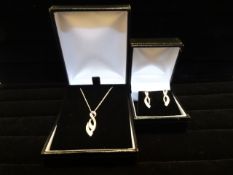 Beautiful 9 carat white gold 18 inch fine chain and pendant compromising of 4 x 0.5mm Round Diamonds