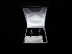 1 x Pair of 9 Carat White Gold Earrings with black and white diamonds. Stunning earrings. Original