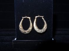 1 x Pair of 9 Carat Yellow Gold Oval Creole Earrings. With etched design. Fantastic earrings.