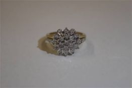 Hallmarked 9k gold ring with 27 diamonds set in white gold.