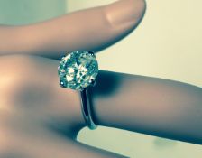 4.04 ct diamond round brilliant cut. Set in 14k white gold ring.